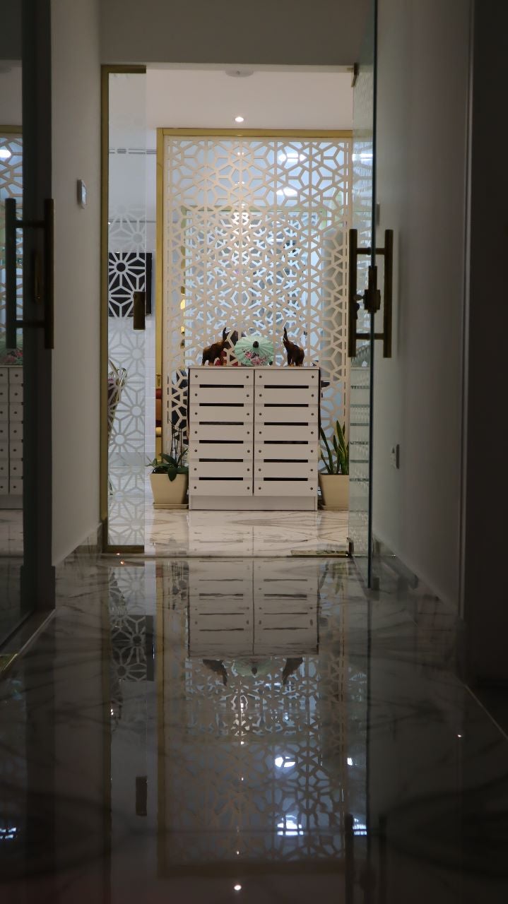Marble corridor leading to the treatment rooms
